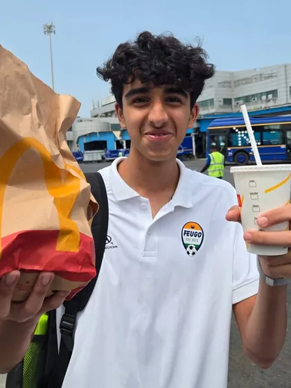 A player enjoying a pre-flight meal, fueling up for the journey.