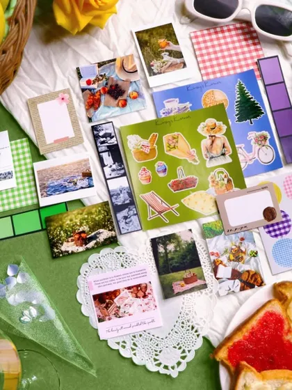 A closer look at the Picnic themed journaling kit, laid out on a picnic blanket.