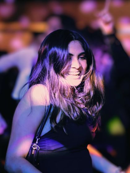 A happy guest enjoying the music at the Rare Rabbit party. My goal is to create a vibe where everyone feels comfortable hitting the dance floor and having a great time.