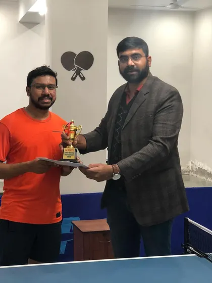 Another look at our winner, Ashis Das, being presented with his first-place trophy and certificate. We make sure every achievement is properly recognized.