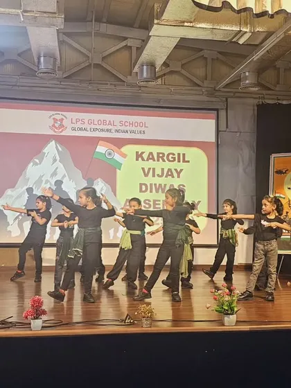 Students perform a powerful dance tribute during the Kargil Vijay Diwas assembly, expressing their respect for our armed forces.
