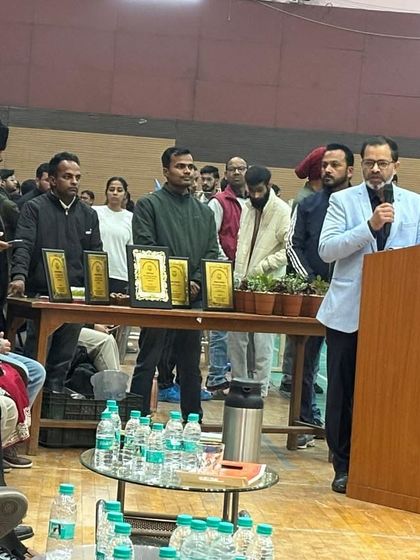 An address to the athletes. Officials speak to the participants at the start of the Inter-Faculty Tournament, emphasizing sportsmanship and participation.
