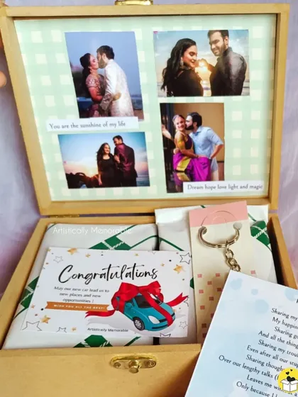 Showing the personalized letter and congratulations card inside the new car hamper.