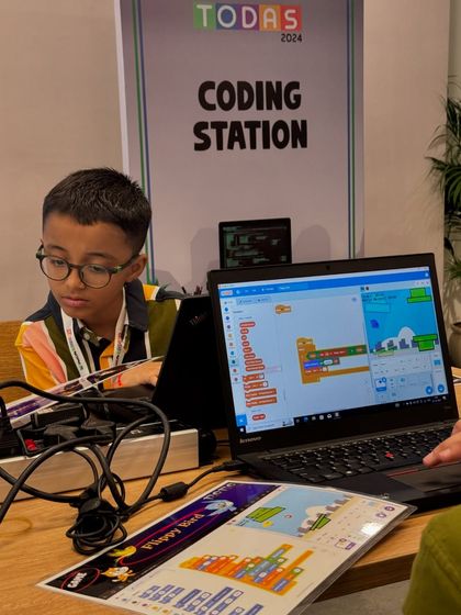 At a MetLife GOSC corporate event, kids and adults were completely engaged at the coding station. I offer exciting robotics activities for corporate events that are fun for all ages.