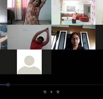 You can practice with me from anywhere. This is a glimpse of an online corporate yoga session, where we focus on simple stretches and breathing exercises that anyone can do from their chair or mat at home.