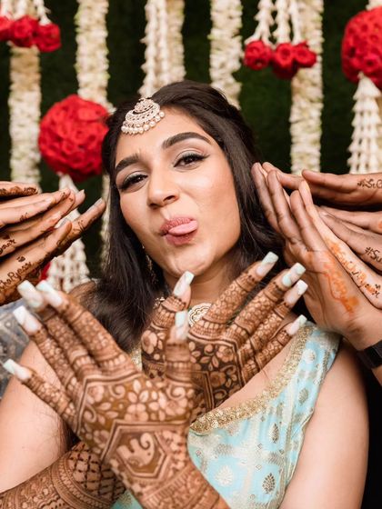 A fun and playful shot from the Mehendi. It's all about celebrating and having a good time, and the makeup is there to make you feel your best.