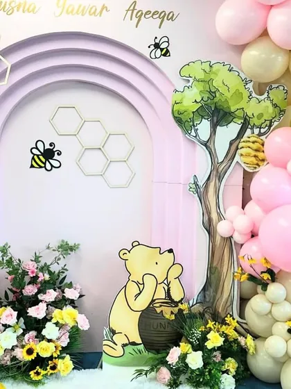 We also offer character-themed decor for Aqeeqa ceremonies, like this sweet Winnie the Pooh setup, to create a warm and child-friendly atmosphere.