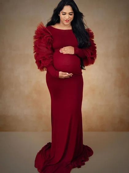 I love the softness of maternity shoots. Here, I used gentle, natural makeup to enhance her beautiful pregnancy glow, creating a timeless and serene portrait she can cherish forever.
