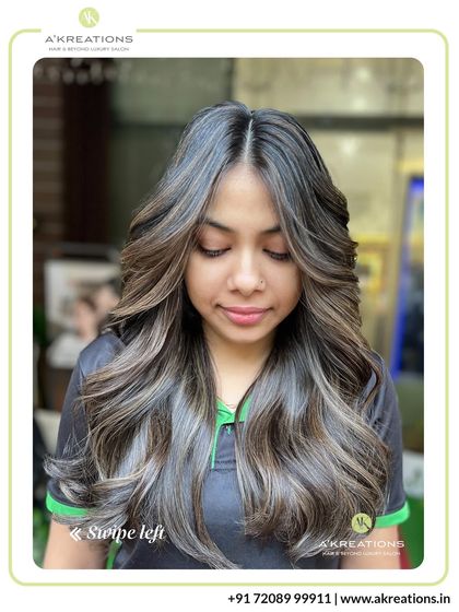 A gorgeous example of cool-toned highlights on dark hair. This look adds a modern, ashy dimension while maintaining a soft and natural feel.
