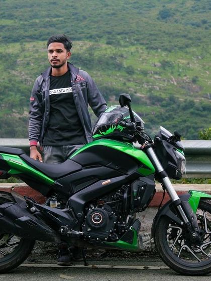 Another shot of a rider and his bike, ready for the Nandi Hills adventure.