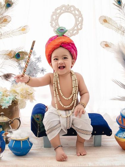 Nand ke anand bhayo. This little Krishna is full of energy and smiles, ready to celebrate Janmashtami in our beautiful studio setup.