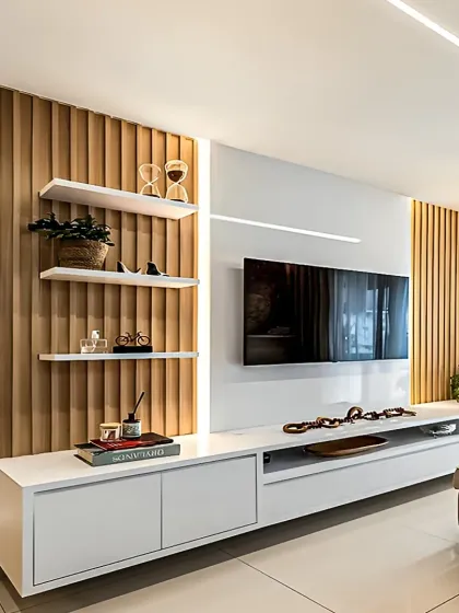 A sleek, contemporary TV unit combining white cabinetry with warm wood fluted panels and integrated LED lighting. This design offers ample storage and a clean aesthetic, making it a stylish centerpiece for any modern living room.