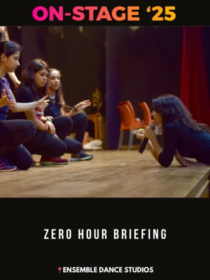 A 'Zero Hour Briefing' on stage. Our instructor gives some final words of encouragement and instruction to the performers right before the show begins.