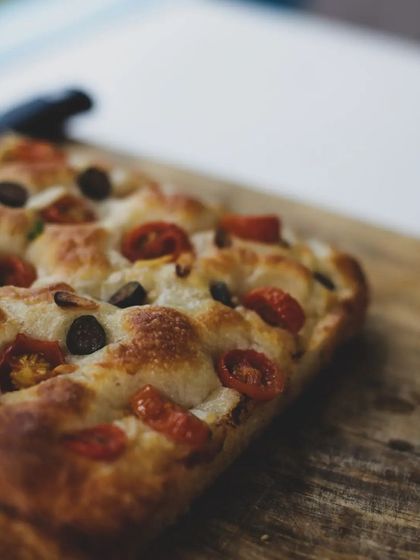 The rustic beauty of a homemade focaccia. We teach you how to get that perfect dimpled texture.