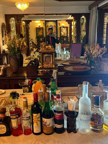 Our bar setup for Dharshna and Aparajit's home Mehendi celebration. We bring a full selection of premium spirits and fresh ingredients to create a complete bar experience, no matter the location.