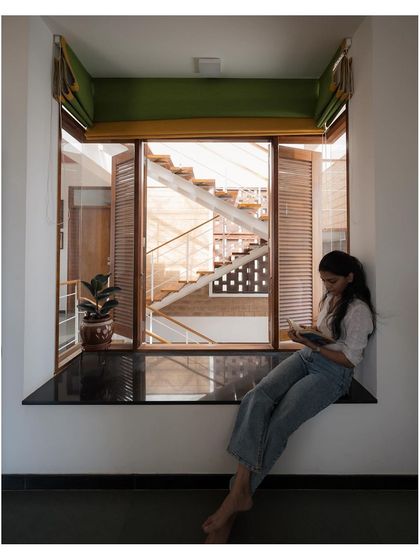 A cozy bay window seat, perfect for reading. We love creating these small, intimate nooks within our homes that offer a quiet space for reflection and a visual connection to the rest of the house.
