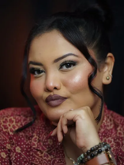 A confident pose inviting you to learn the art of self-makeup with me.