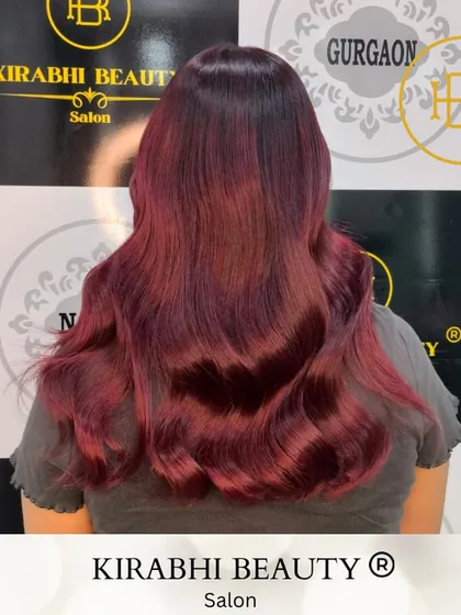 Another look at this gorgeous deep red hair color. The soft waves really help to show off the richness and dimension of the shade.
