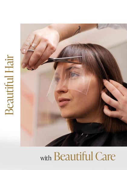 Beautiful hair with beautiful care. A stylist performs a precision cut on a sharp bob with a fringe, showcasing the meticulous attention to detail that defines our work.