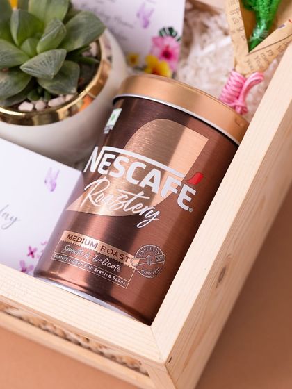 A can of Nescafe Gold Roastery coffee, selected for a coffee lover's birthday hamper. I always tailor the contents to the recipient's specific tastes.