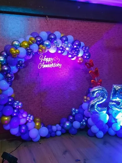 A full view of the purple-themed 25th anniversary decoration.