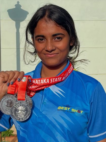 A close-up of one of our talented shooters with her medals from the 13th State shooting competition in Air Pistol ISSF.