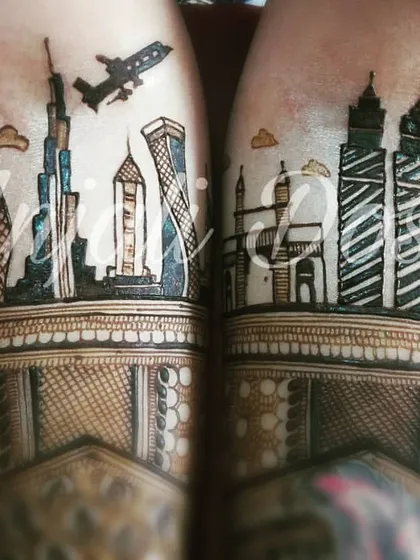 This bride was an air hostess, and her story connected two great cities. I designed this unique piece featuring the Dubai and Mumbai skylines.