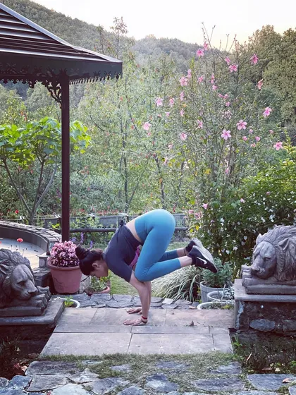Bakasana, or Crow Pose, is an arm balance that teaches us about stability and trust. Here, I'm practicing in a garden, using the focus and strength built through consistent practice to find a moment of flight.