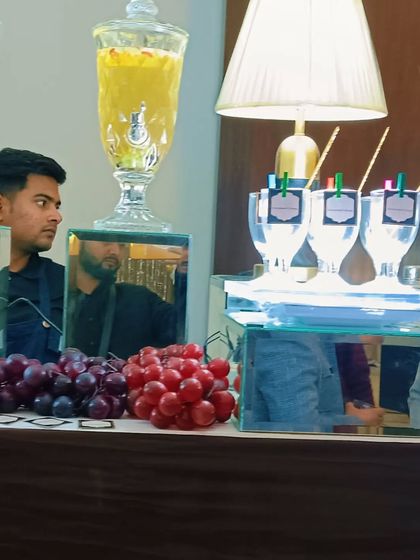 A detail shot showing our drink dispensers and personalized glassware, ready for guests.