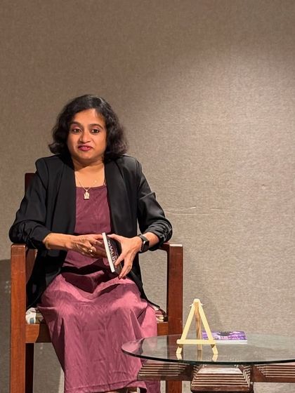 A candid moment from a book discussion. Our intimate setting allows for genuine interaction between speakers and attendees.