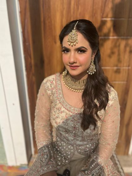 A beautiful portrait showcasing the final look. The skin looks healthy and radiant, which is always my number one goal.