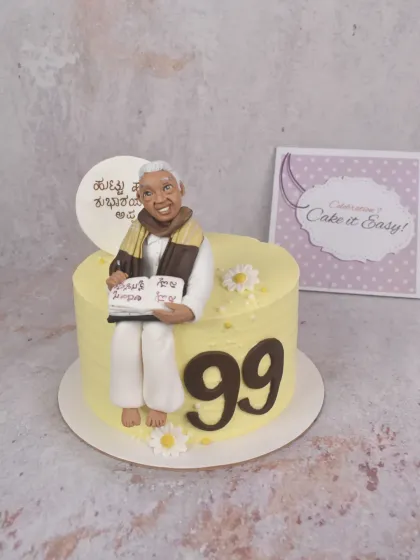 Another view of the 99th birthday cake, showing the clean design and the heartfelt custom topper.