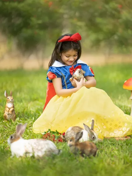 We create real-life fairy tales for your little ones. This Snow White session, complete with gentle bunny friends, was an absolute dream to photograph in a beautiful outdoor setting.