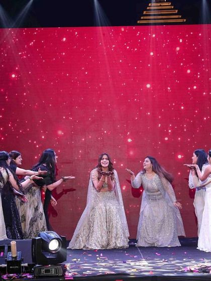 The bride tribe sending kisses to their favorite girl during her sangeet performance.