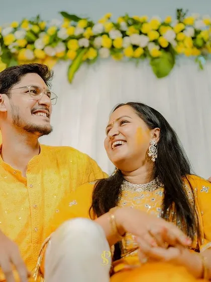 Capturing the easy, natural chemistry of a couple during their Haldi function. These unposed moments of laughter are the heart of my storytelling approach.
