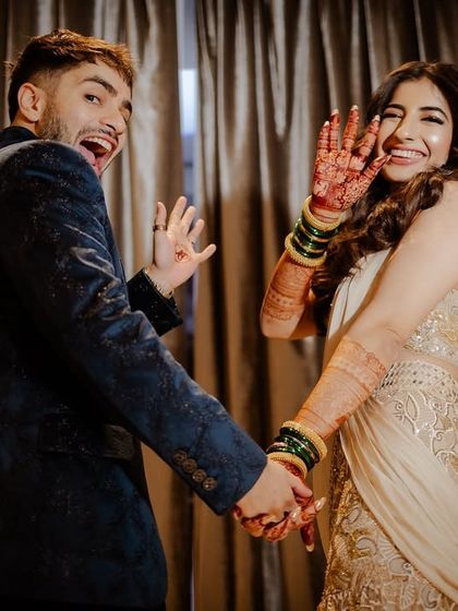 A playful and goofy portrait of the couple, showing their fun side during the after-party.