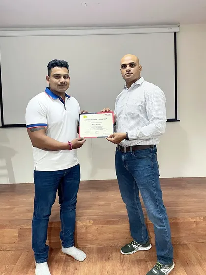 A duplicate image of me receiving my nutrition certification, emphasizing this important milestone in my professional development.