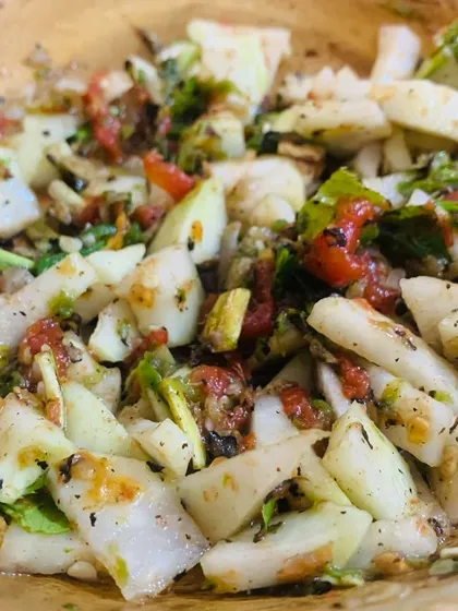 A simple and refreshing pear chutney. I mix chopped pear with roasted tomatoes, chillies, and herbs for a sweet and spicy side dish.