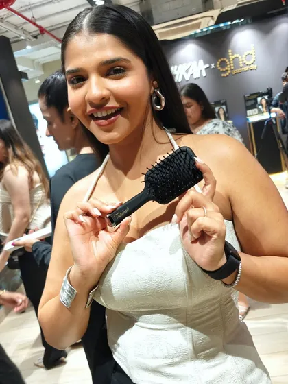 Another happy guest with her personalized GHD brush. The goal of live personalization is to create a memorable interaction that deepens the customer's connection to the brand.