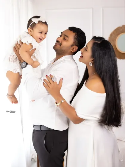 The purest joy is in these family moments. Capturing the laughter and love between parents and their baby is at the heart of what I do.