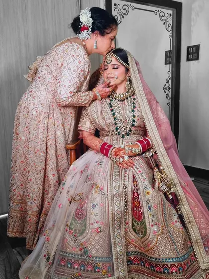 A beautiful, emotional moment between the bride and her mother. It's a privilege to be a part of these intimate family moments.