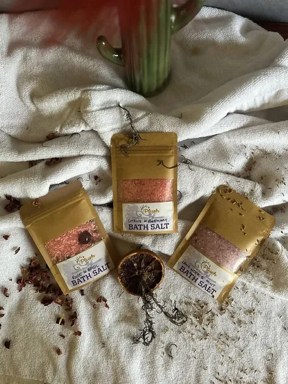 An artful shot of my three bath salt variants: Rose-Basil, Citrus-Rosemary, and Lavender-Mint. Each one is designed to create a spa-like experience at home.
