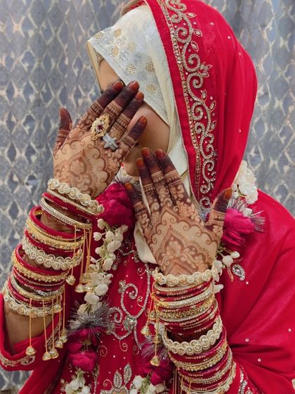A candid shot showing the beautiful henna stain on my cousin for her 'Baat Pakki'.