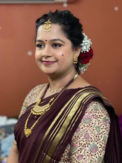 A close-up of Swathi's natural makeup look. The focus is on clean skin and soft definition, proving that you don't need heavy makeup to look stunning.