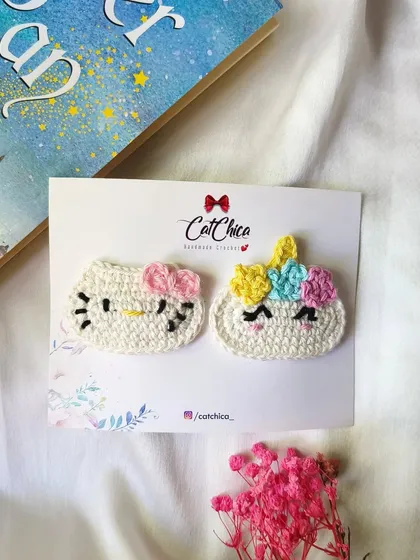Another beautifully styled shot of our Hello Kitty and unicorn clips. They make a perfect gift for any fan.