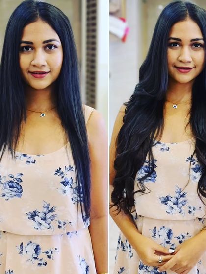 A closer look at the wavy transformation, highlighting the soft curls and added volume that frame her face perfectly.