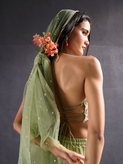 This extensive collection features a wide array of modern festive attire. From vibrant sharara sets and elegant anarkalis to chic jumpsuits and light lehengas, these pieces are curated for wedding guests and anyone looking for a stylish outfit for a special occasion.