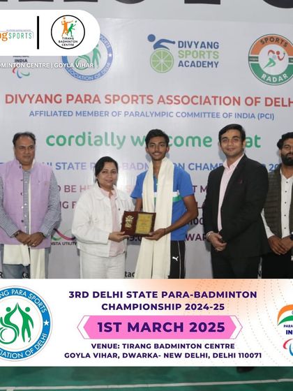 An award ceremony during the para-badminton championship, with Member of Parliament Smt. Kamaljeet Sehrawat felicitating a player.