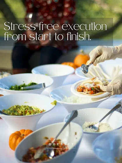 We promise stress-free execution from start to finish. This image captures our professional team in action at a live taco bar, ensuring every guest receives personalized service and perfectly assembled bites.