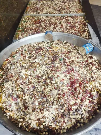 A celebration needs a sweet ending. Here are huge trays of my Shahi Tukda, loaded with nuts and ready to be served. I make sure there is plenty for everyone.